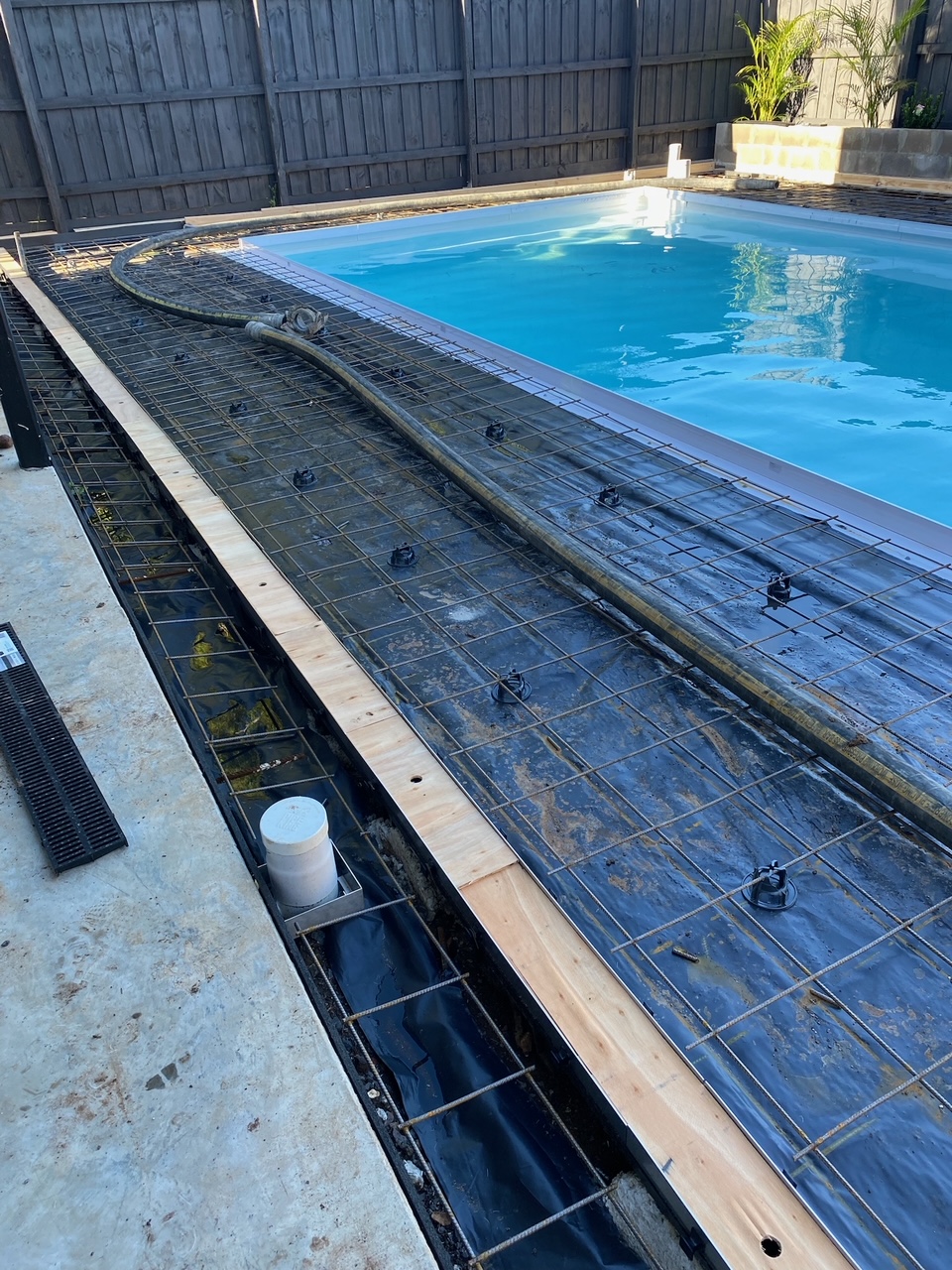 Linear pre-pour HIDE concrete linear drain cover